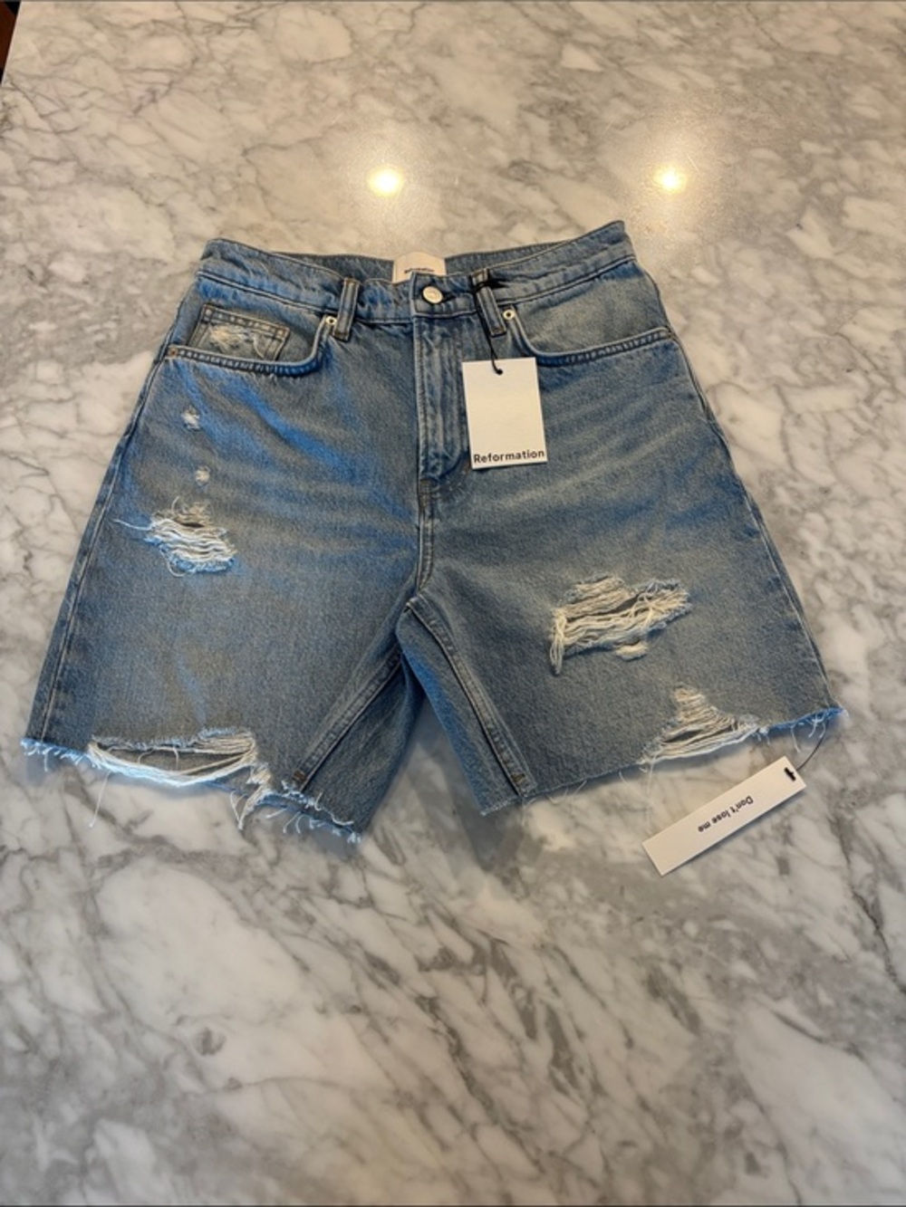 Reformation Light Blue Distressed Mid-Rise Denim Shorts